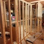 Moving walls for a dry bar in family room